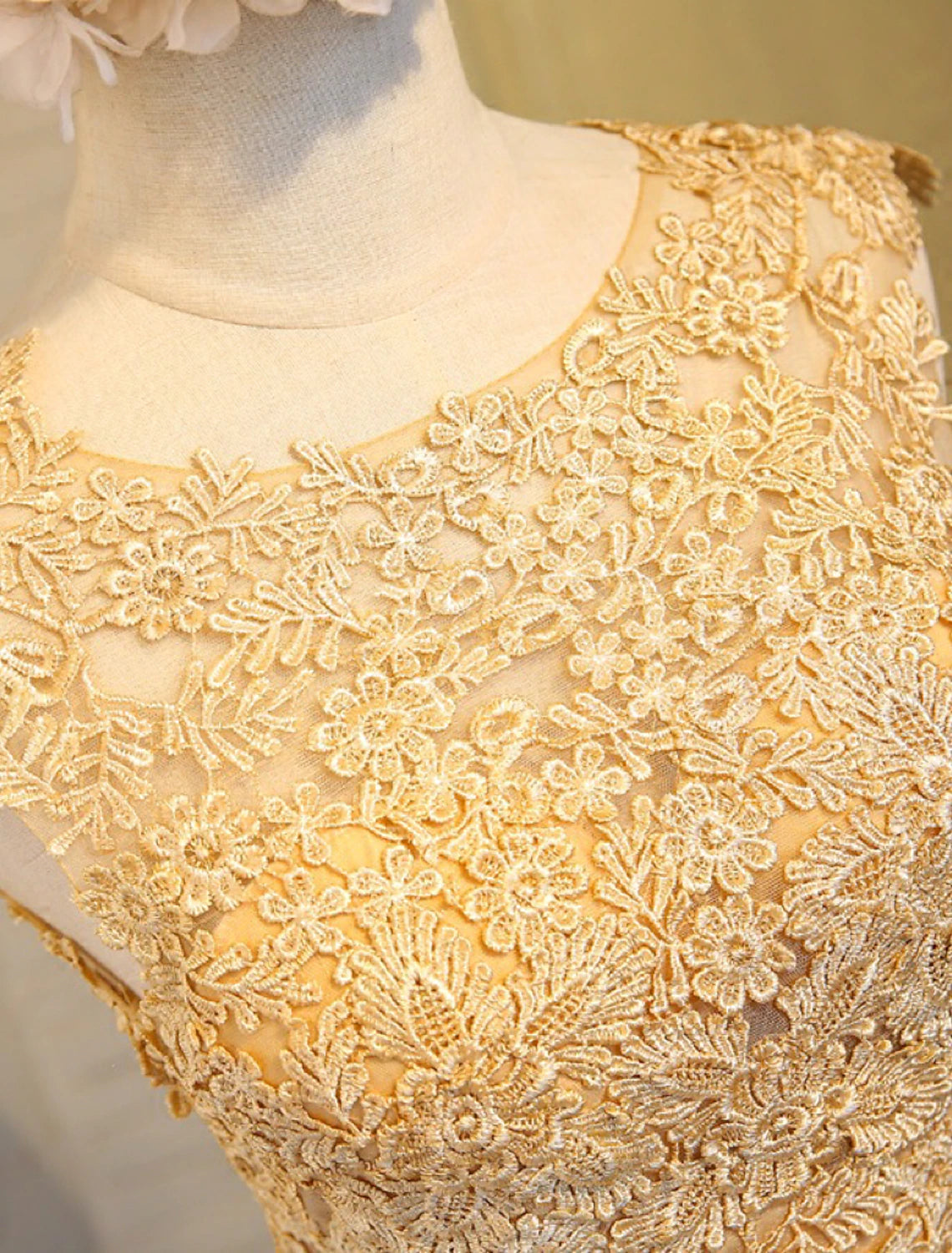 Side view of knee-length A-Line dress with lace bodice.