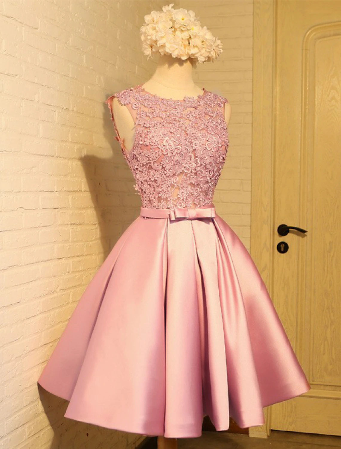 Close-up of lace detail and jewel neckline on A-Line dress.