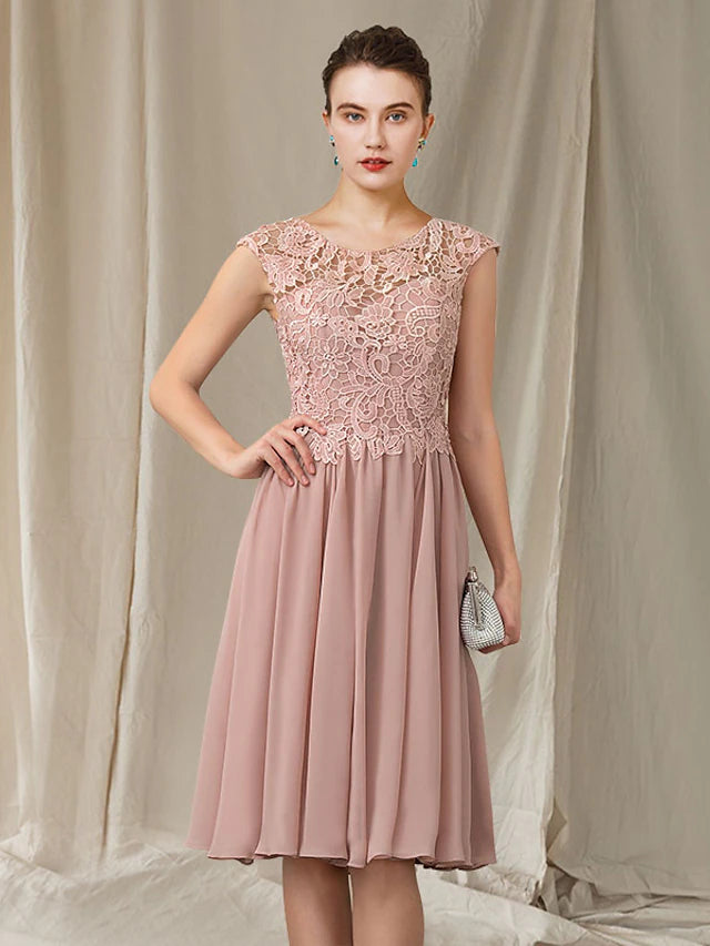 Side view of knee-length A-line dress showing pleats and chiffon fabric.