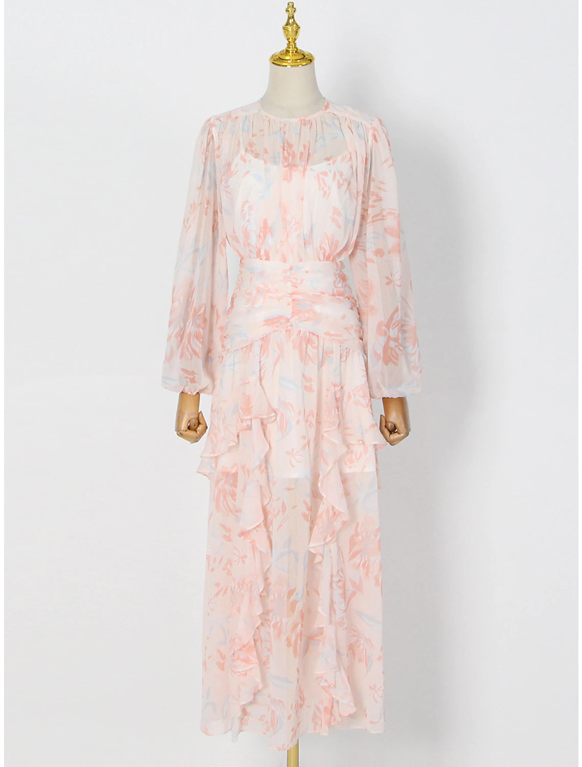Elegant A-line floral maxi dress with long sleeves and jewel neck, front view.