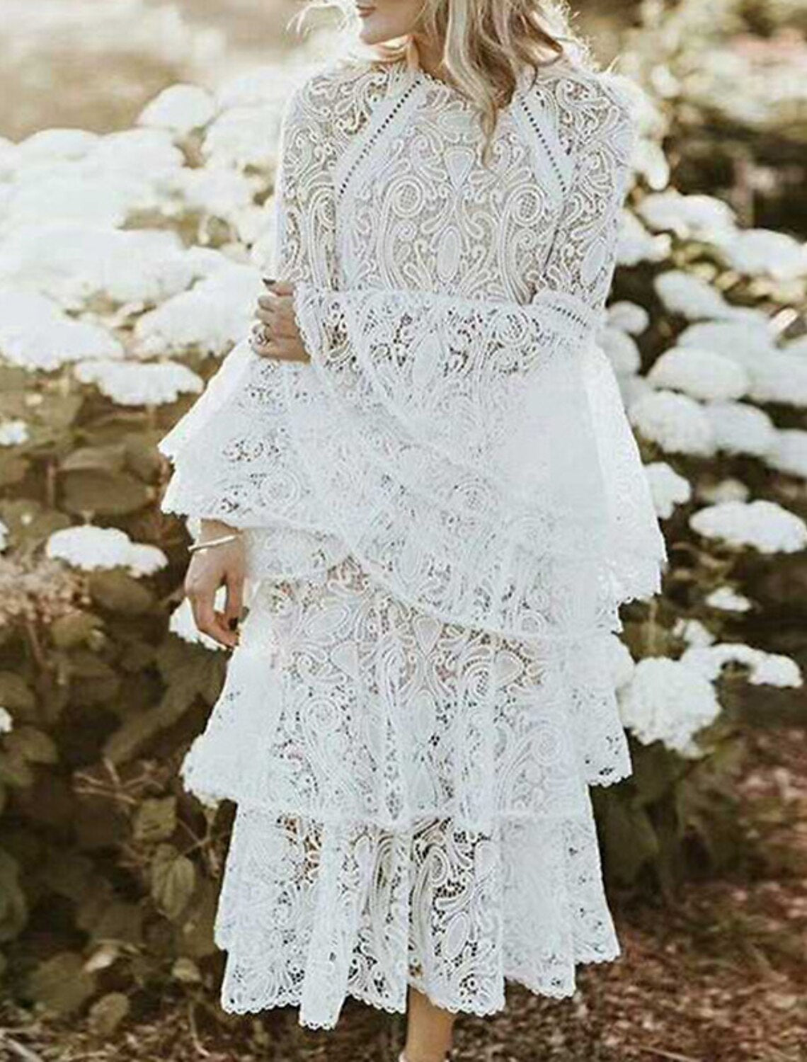 A-Line ankle length dress featuring jewel neck and long sleeves.