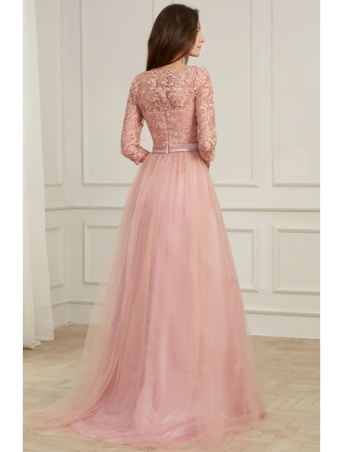 Back view of the A-line formal dress, showcasing the sweep train and lace details.