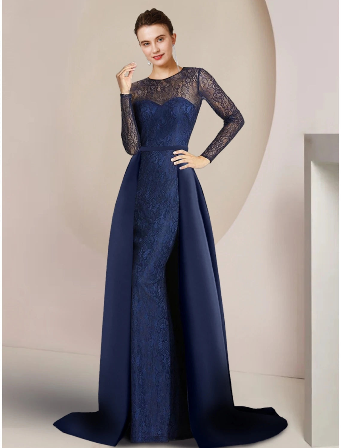 Elegant A-Line Mother of the Bride dress with long lace sleeves and jewel neck.