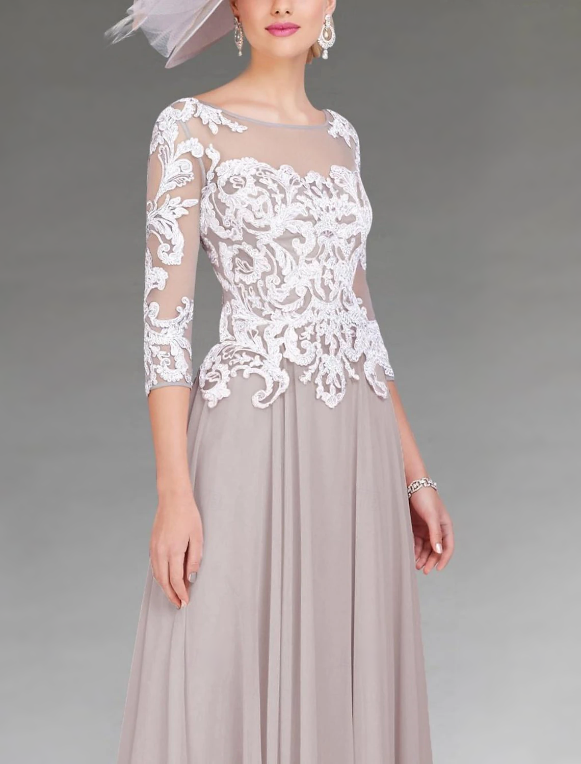 Full length view of the Mother of the Bride dress, showcasing its flowing A-line silhouette.