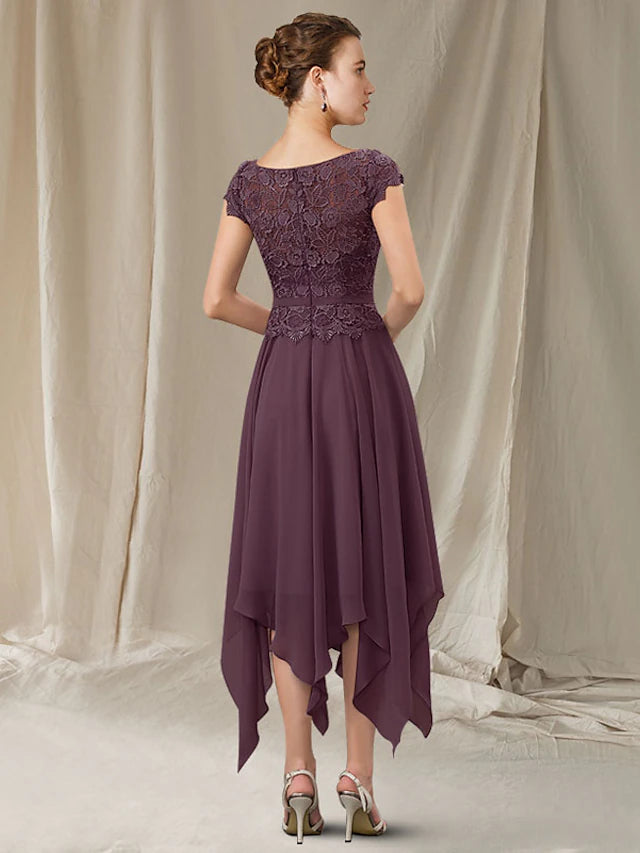 Close-up of the delicate lace appliques and chiffon fabric on the short sleeve of the mother of the bride dress.
