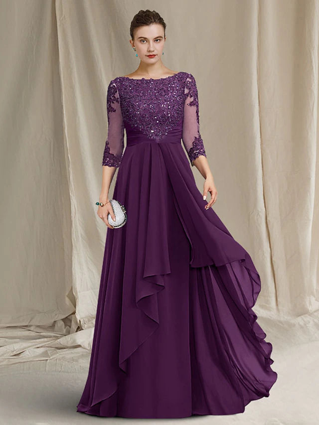 Elegant A-line Mother of the Bride gown in navy blue with jewel neck and 3/4 sleeves.