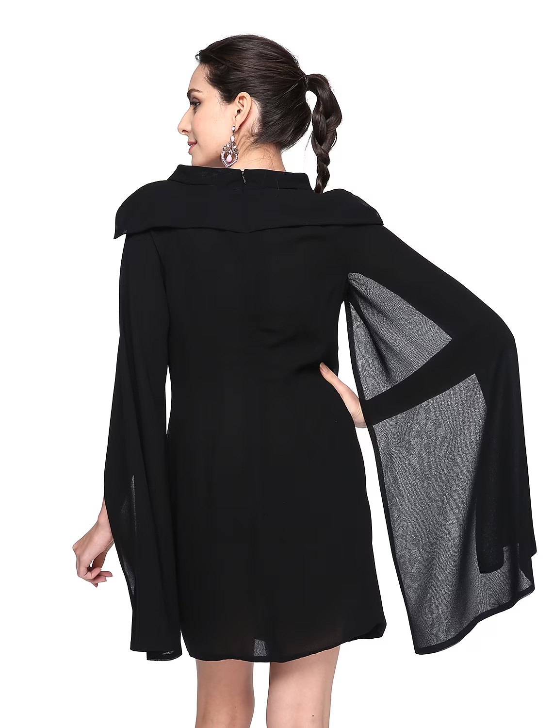 Side view of a pleated black mini dress.