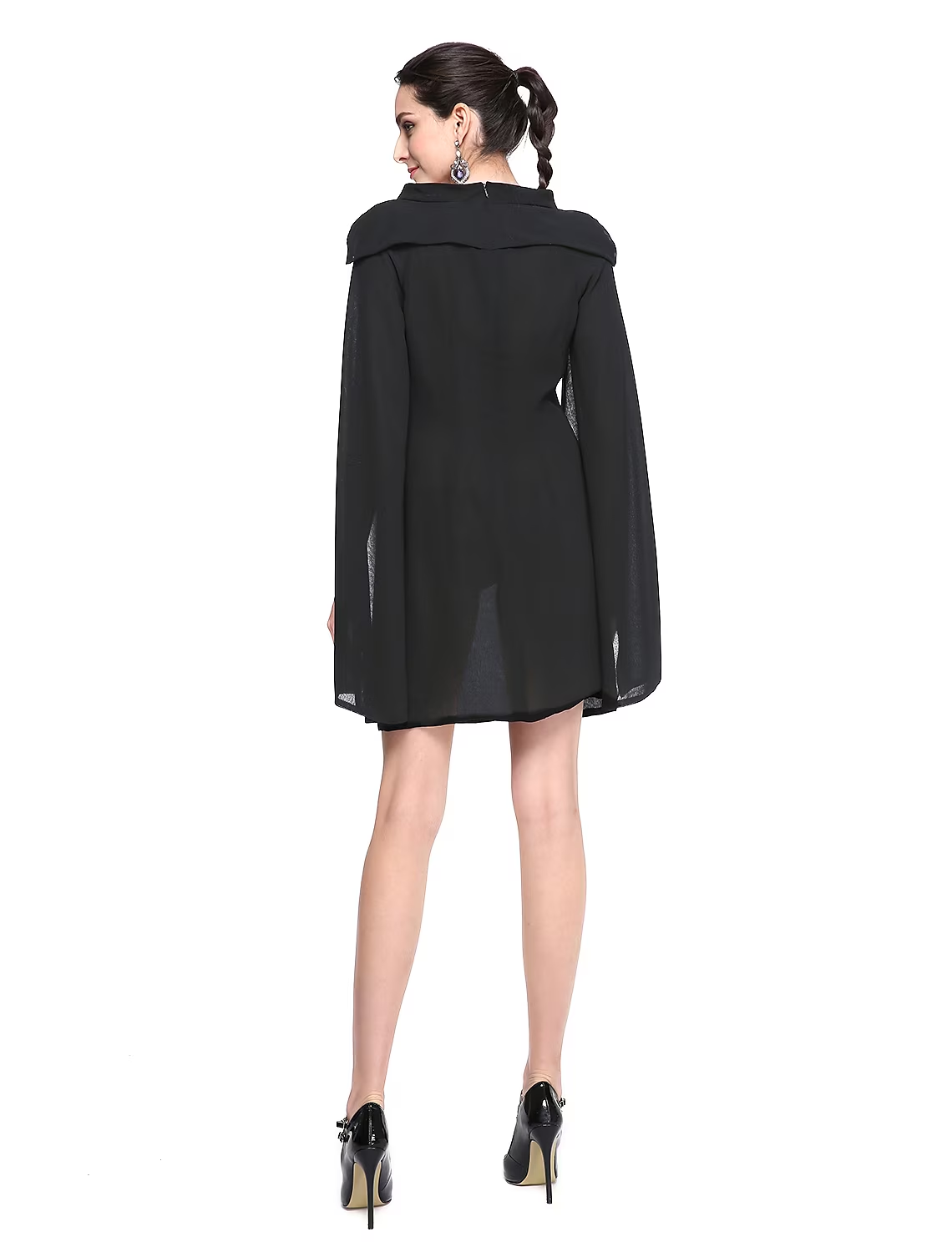 Close-up of the jewel neck and chiffon fabric on a black dress.