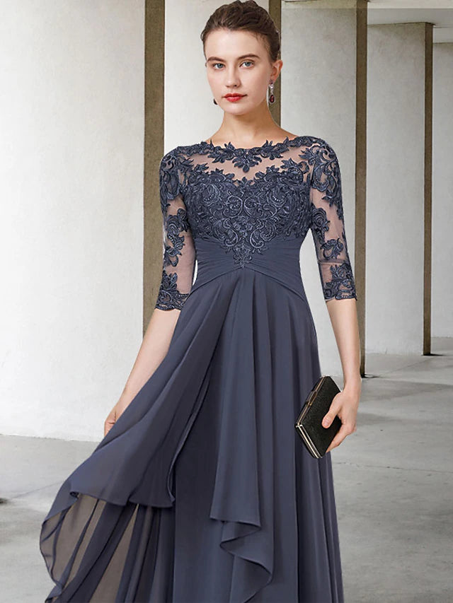 Close-up of the lace and ruched details on an elegant formal dress.