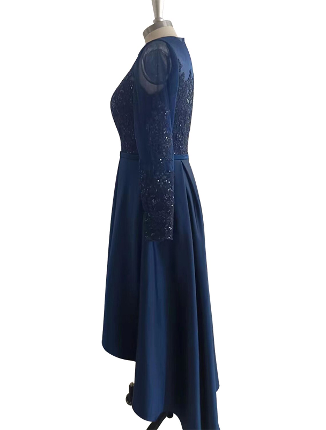 Back view of A-line satin cocktail dress with long sleeves.