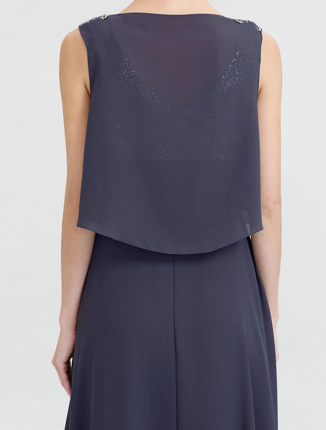 Close-up of the sequined bodice and jewel neckline of the formal dress.