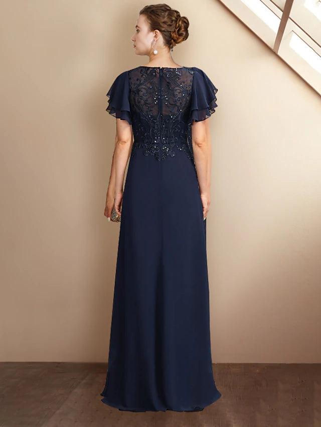 Close-up of the sequin appliques and lace detail on a short sleeve of the Mother of the Bride dress.