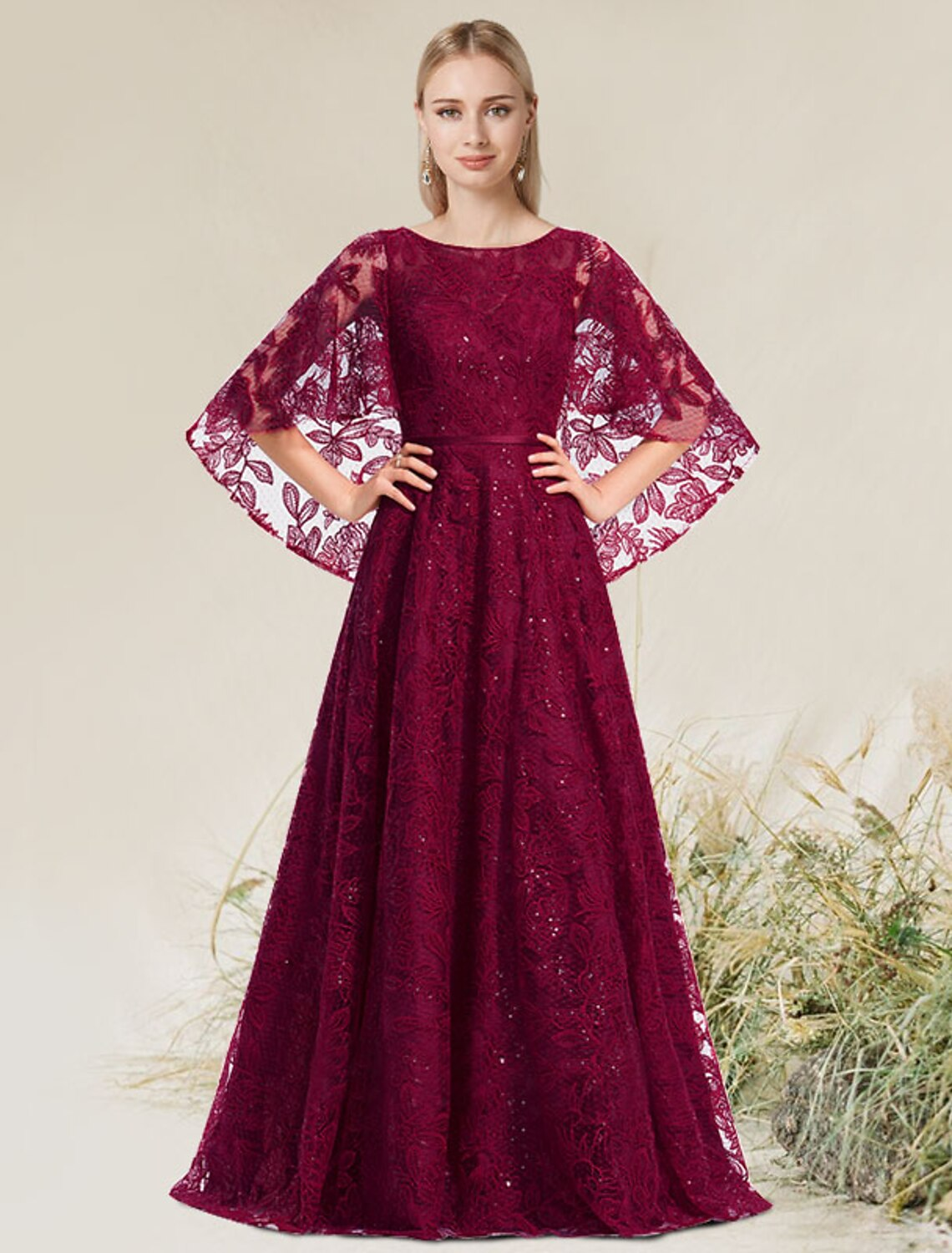 Elegant A-line formal dress with jewel neck, short sleeves, and floral lace appliques.