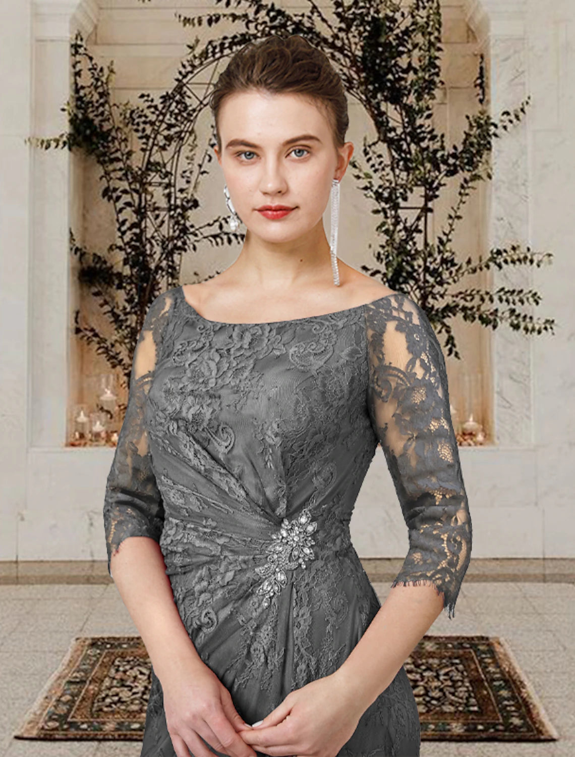 Close-up of the jewel neck and short lace sleeves on the navy blue dress.