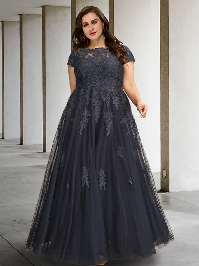 Elegant A-line plus size mother of the bride dress with short sleeves and jewel neck.