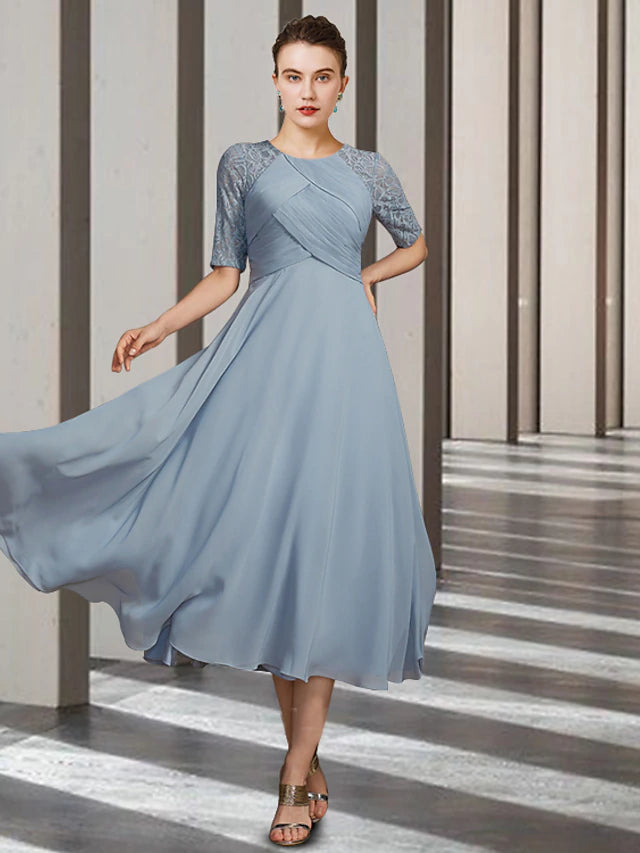 Elegant A-Line Mother of the Bride dress with jewel neck and short sleeves.