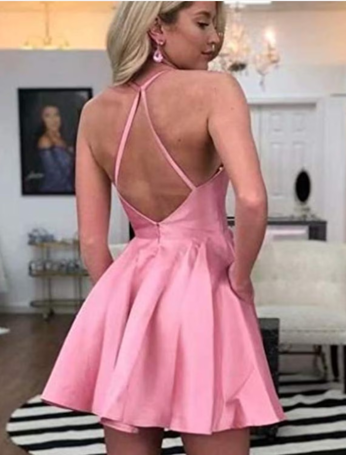 Back view of jewel neck A-Line mini dress.