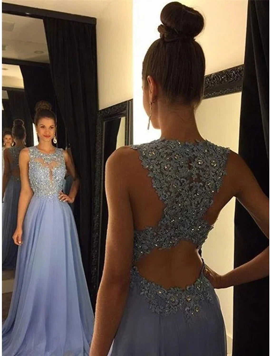 Front view of an elegant A-Line chiffon prom dress with jewel neck and intricate beading.