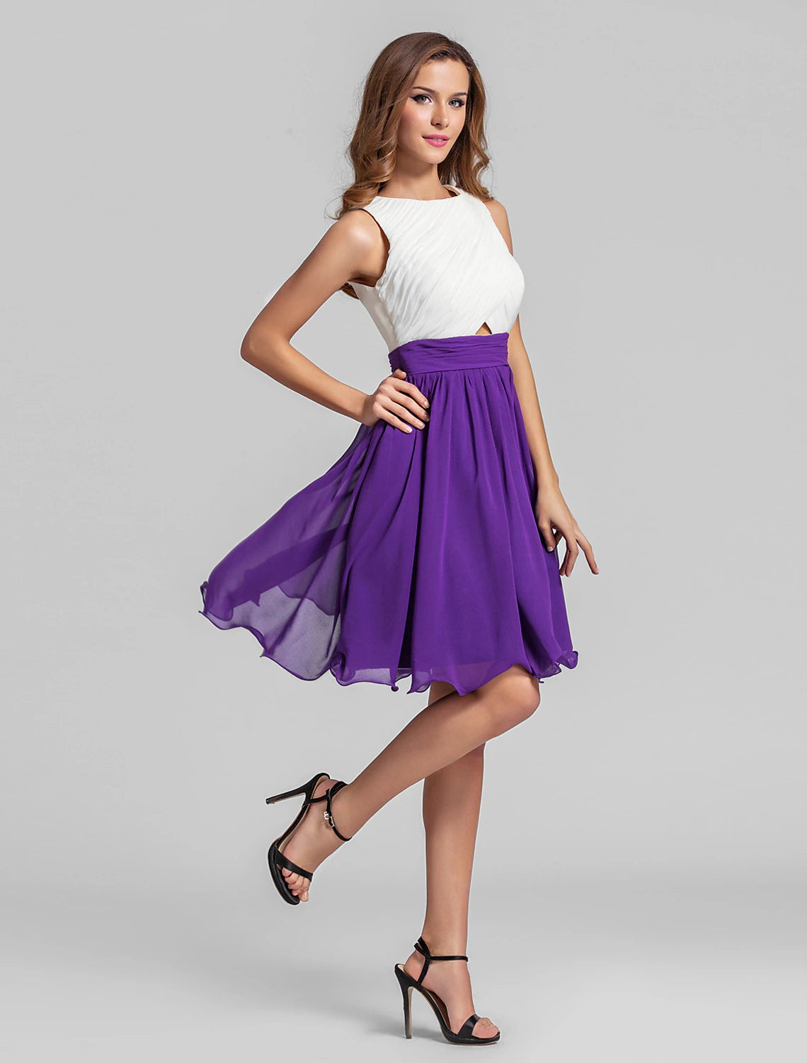 Close-up of the jewel neckline and ruched bodice on the chiffon dress.