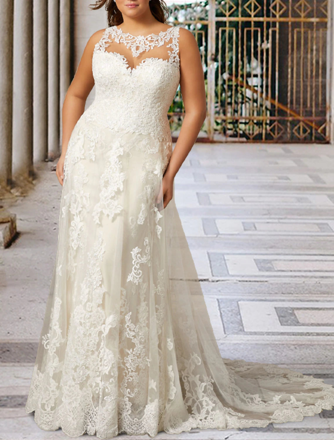 Back view of plus size A-line wedding gown with court train.