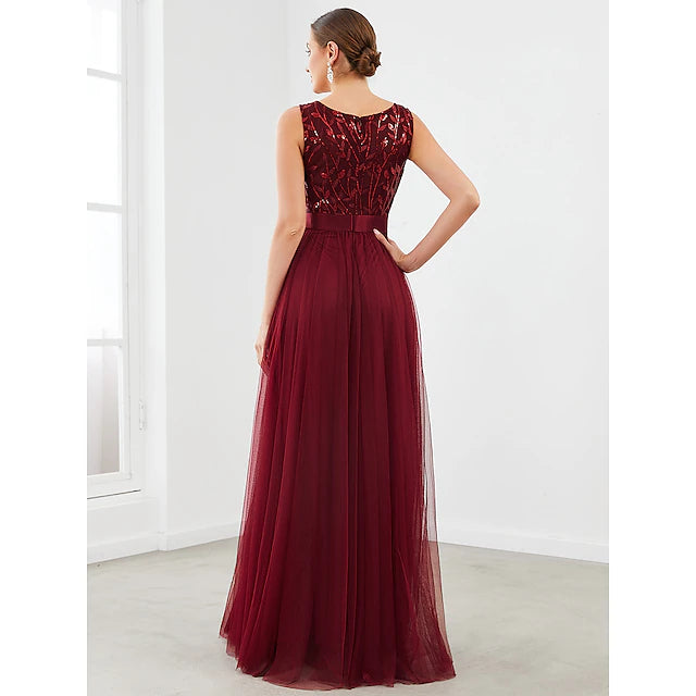 Close-up of sparkling tulle fabric on a tiered A-Line bridesmaid dress.