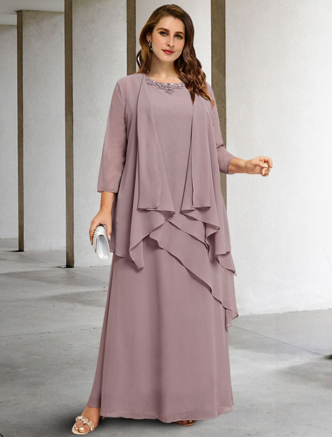 Elegant A-line two-piece mother of the bride dress with jewel neck and sequin appliques.
