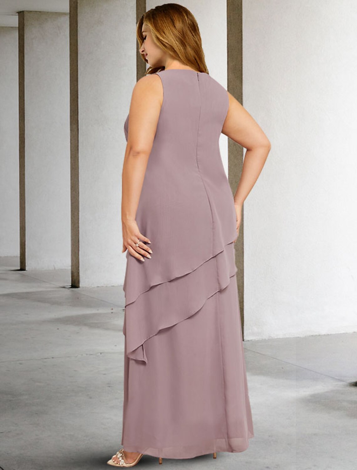 Side view of the floor-length plus size formal gown.