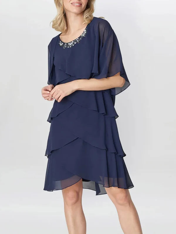 Elegant A-Line knee-length mother of the bride dress with scoop sleeves.