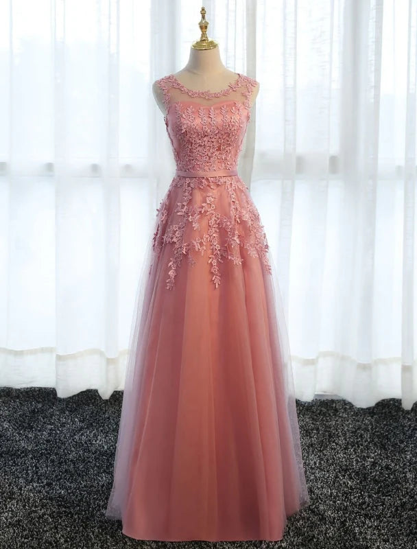 Elegant A-line long formal dress with lace appliques and tulle skirt.