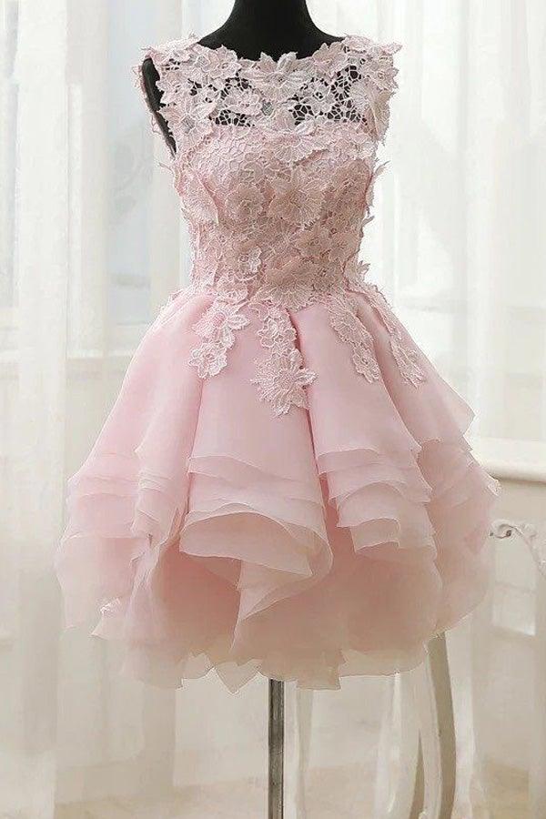 Pink A-line lace homecoming dress with bateau neckline and appliques.