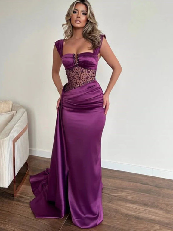 Elegant A-line prom dress with lace, beading, V-neck, and spaghetti straps.