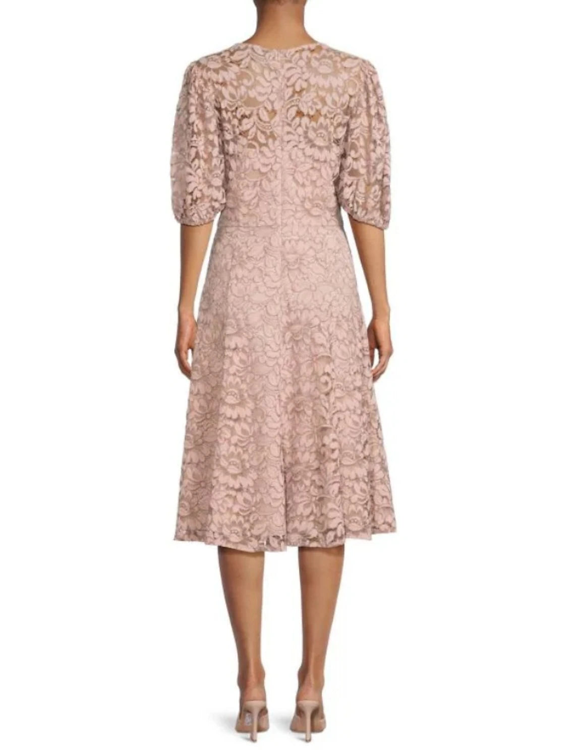 Side profile of the A-line dress highlighting the lace half sleeves and knee length.
