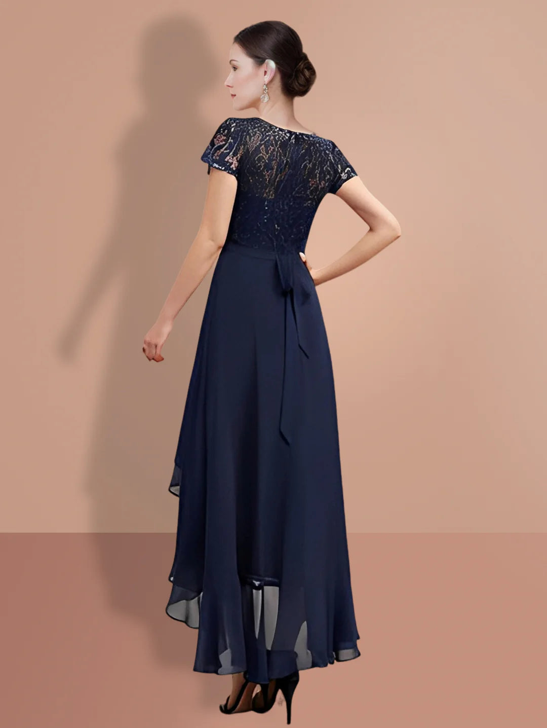 Back view of the A-line lace knee-length Mother of the Bride dress with short sleeves.