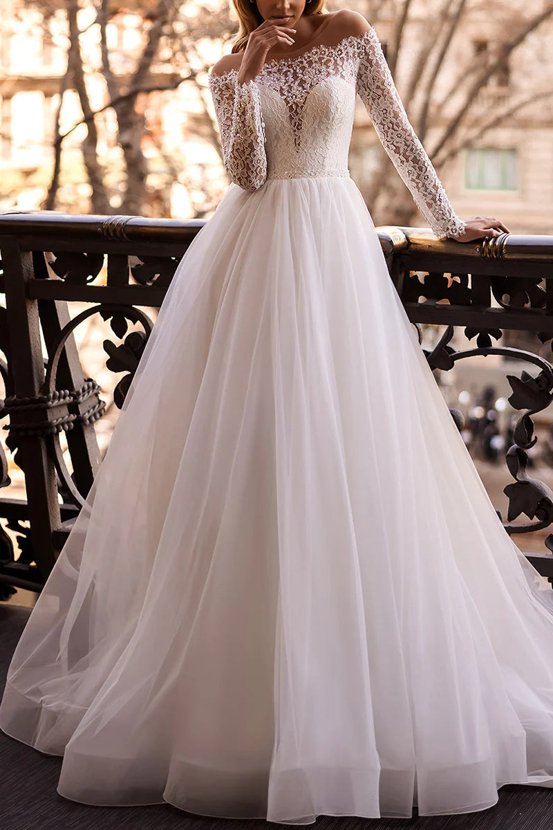 Elegant A-Line lace wedding dress with long sleeves and a plunge neckline.