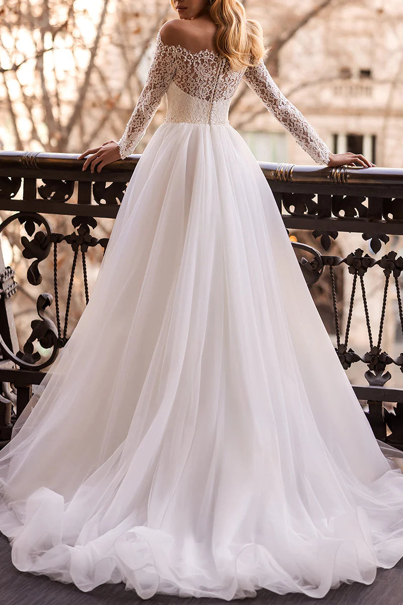 Full view of an A-Line lace wedding dress, showcasing its floor-length design.