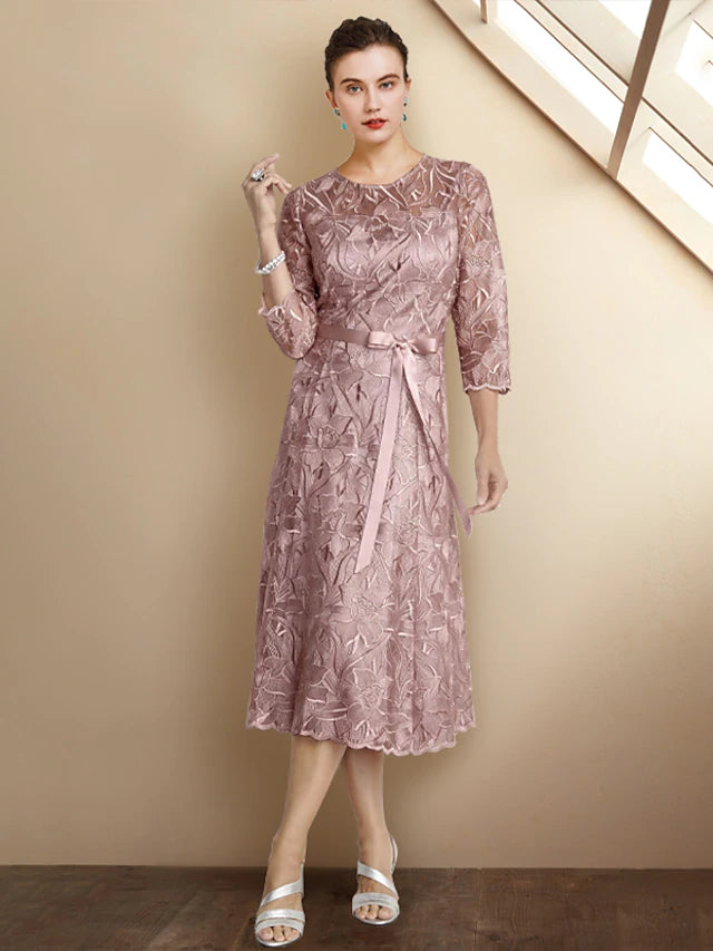 Elegant A-line Mother of the Bride dress with jewel neck and 3/4 sleeves.