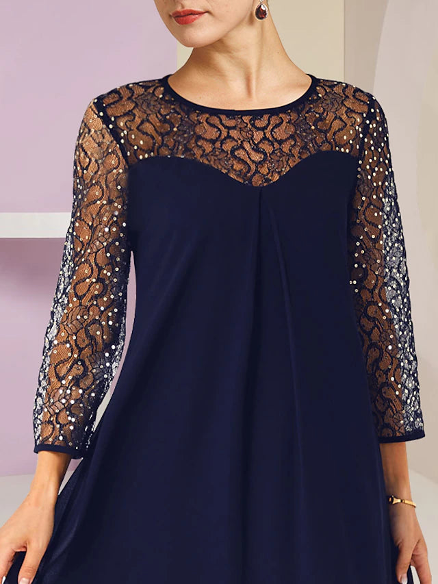 Back view of the A-Line formal dress, showing knee-length hem and delicate lace details.