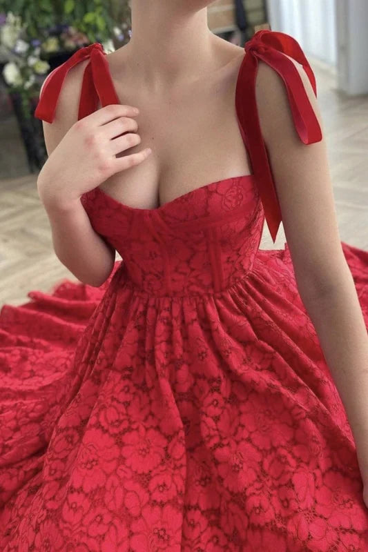 A-line lace tea length prom dress, side view, showing pocket detail.
