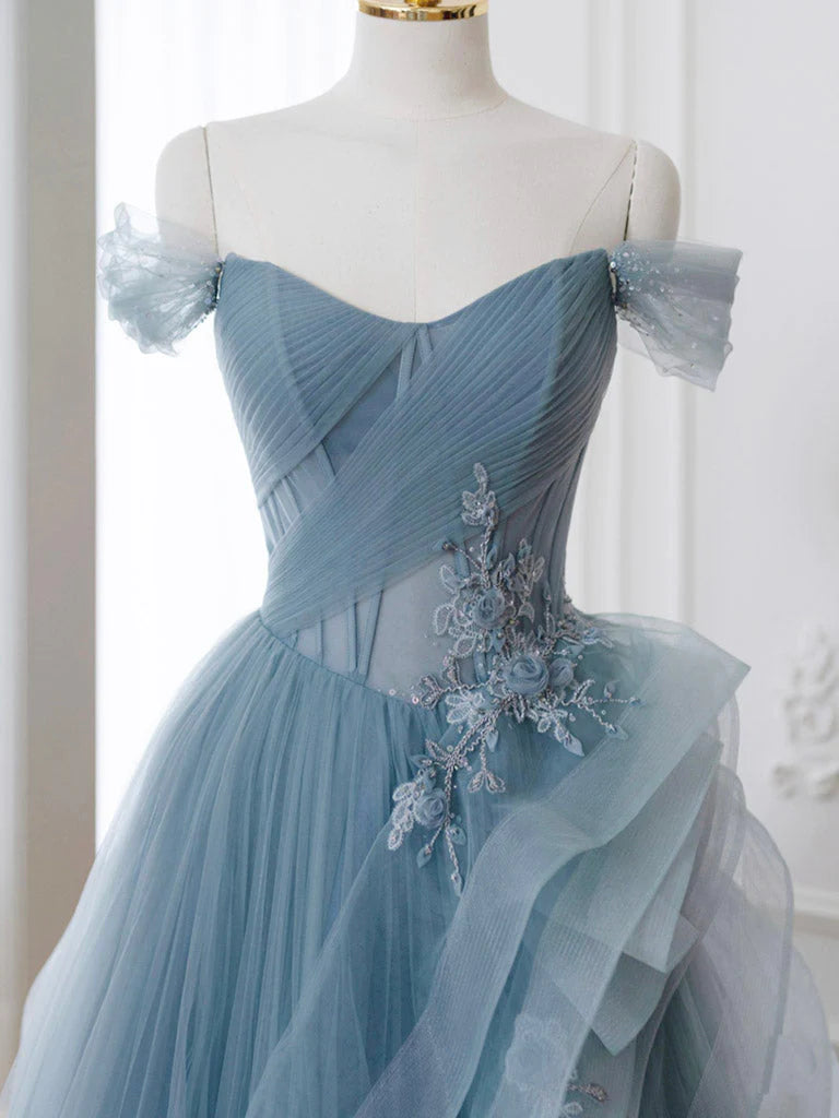 Close-up of the lace detail on the V-neck prom dress.