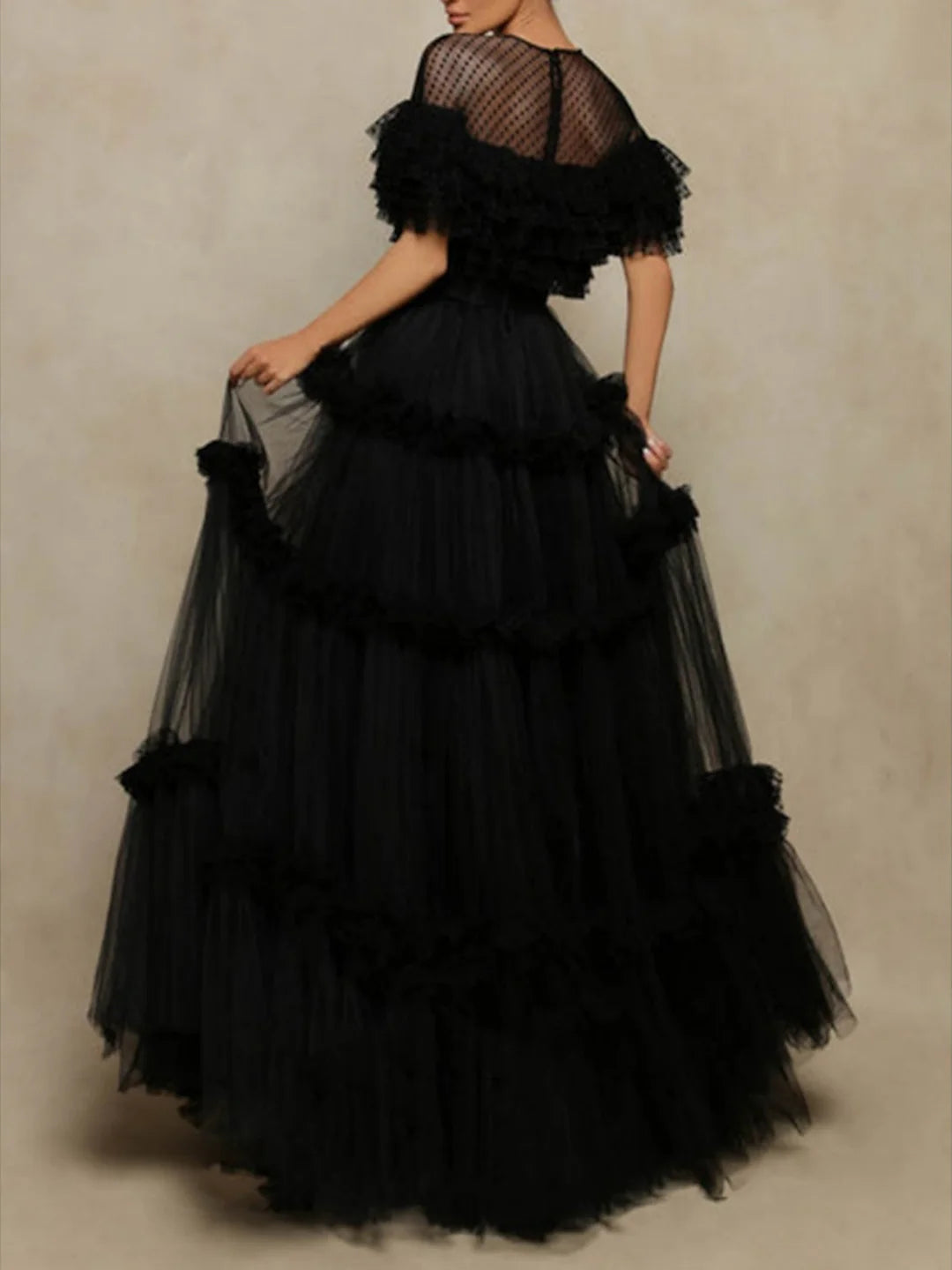 Full view of an A-line ankle-length formal dress, showcasing its elegant silhouette and long sleeves.