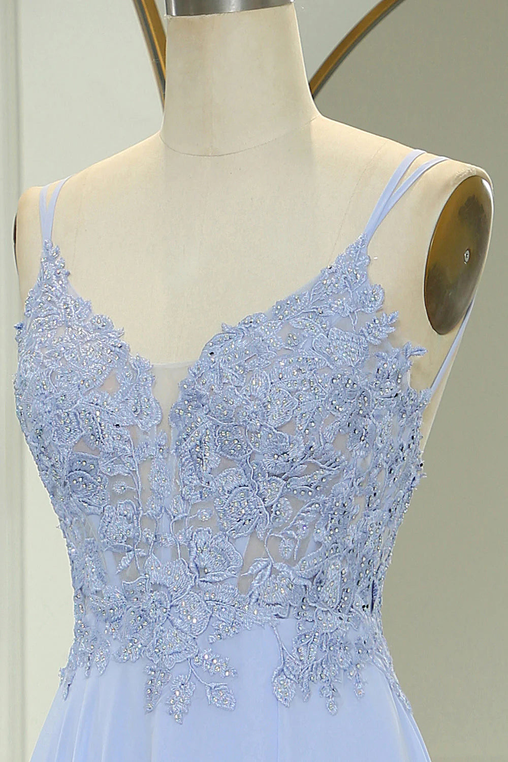 Close-up detail of the high slit on the long prom dress.