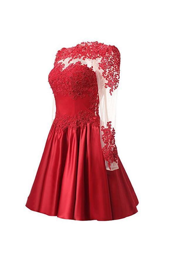 Close-up of applique details on the long sleeve A-line dress.