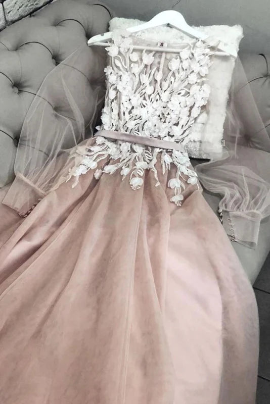 Elegant A-line prom dress with long sleeves and delicate appliques.