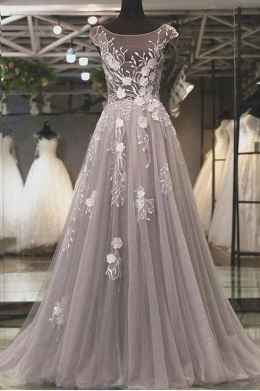 Elegant A-line formal prom dress with long tulle sleeves and lace appliques.