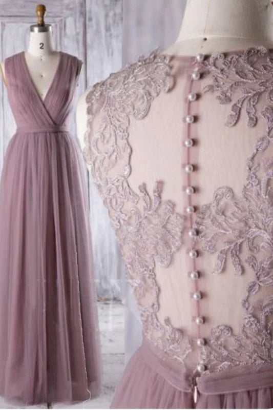 Elegant A-line maxi prom dress with a sheer mock neck and sleeveless design.