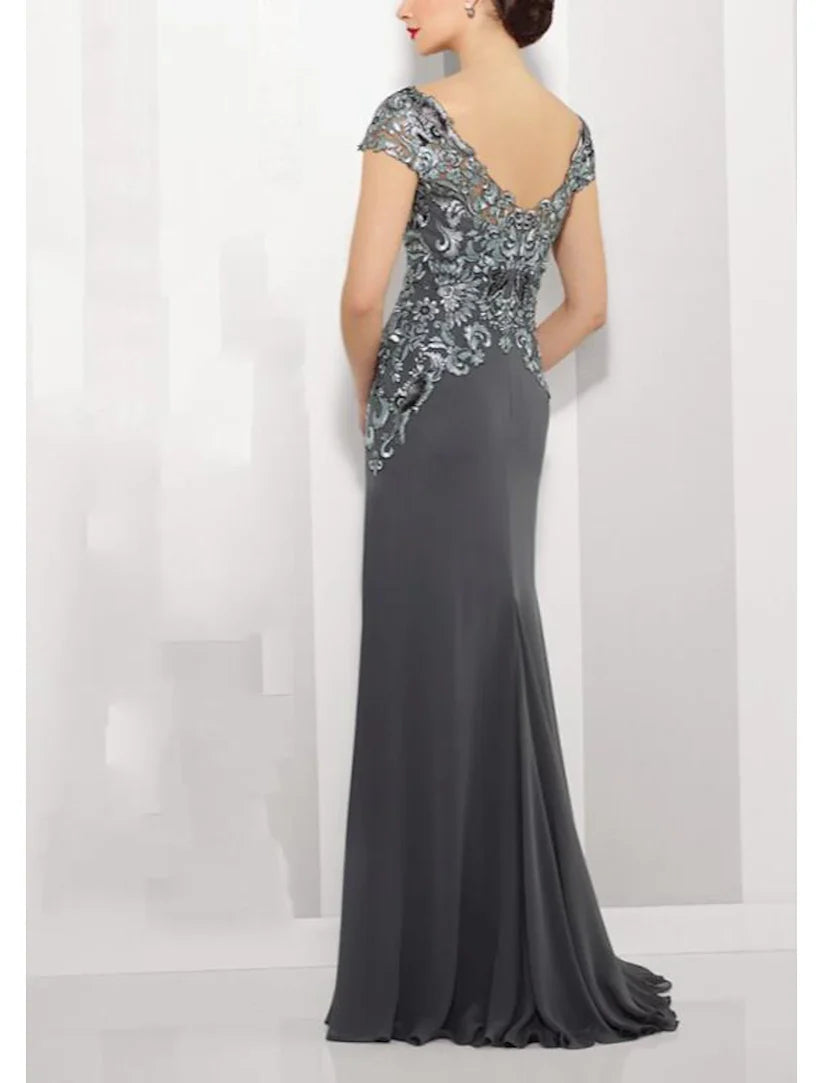 Side view of an A-Line Mother of the Bride dress, showcasing lace appliques and floor-length design.