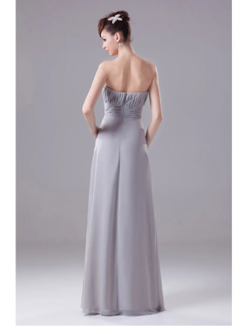 Close-up of the convertible features and draped details on the A-line chiffon gown.