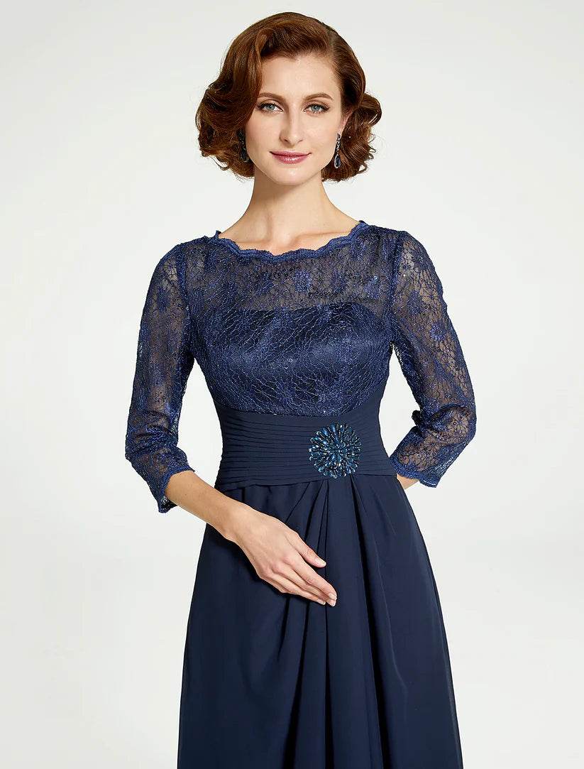 Side view of a floor-length mother of the bride dress, showcasing the A-line silhouette and lace details.