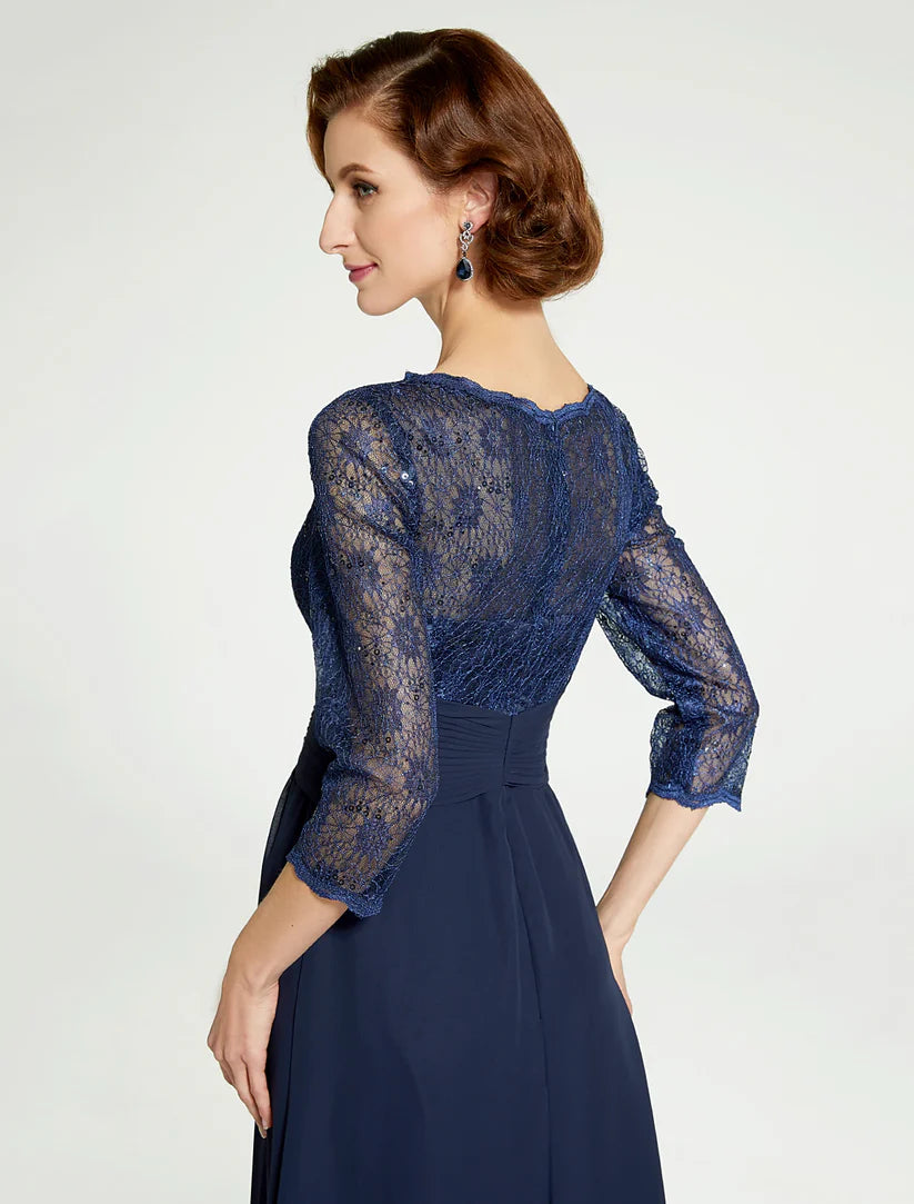 Close-up of the lace and ruching details on an elegant formal gown.