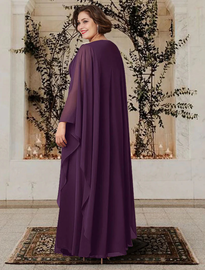 Close-up of the chiffon fabric, pleats, and crystal details on the long sleeve V-neck A-line dress.